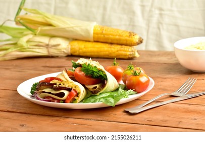 plate wiht mexican food corn and taco - Powered by Shutterstock