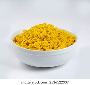 A plate with yellow saffron rice, uncooked rice, and homemade steamed turmeric rice in a bowl - Powered by Shutterstock