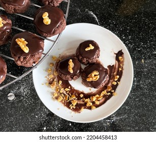 Plated Afghans With A Chocolate Smear And Walnuts 