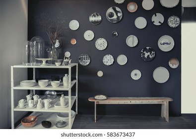 plates in interior on kitchen wall