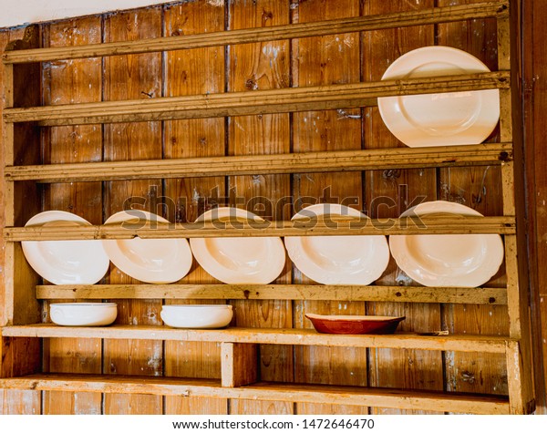 Plates On Old Wooden Cabinet Stock Photo Edit Now 1472646470