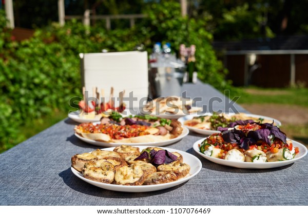 Plates Snacks On Servered Buffet Table Stock Photo Edit Now