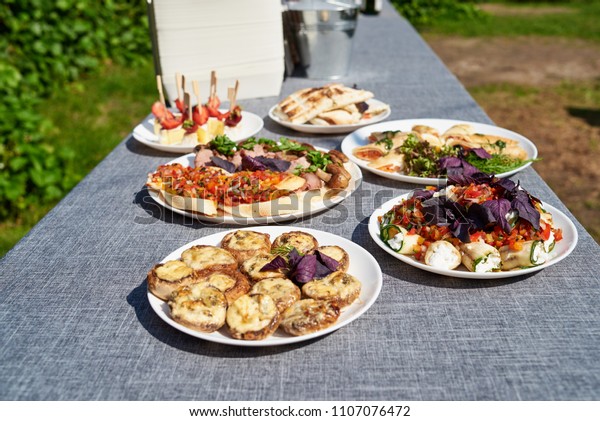 Plates Snacks On Servered Buffet Table Stock Photo Edit Now