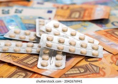plates with tablets on the background of euro bill,. concept of the expensive cost of healthcare - Shutterstock ID 2042676941