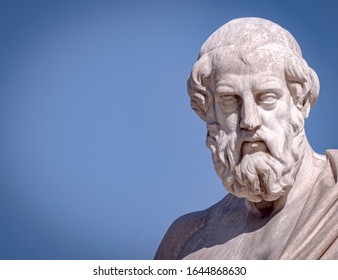 Plato The Ancient Greek Philosopher White Marble Bust Sculpture Under Blue Sky Background, Space For Your Text