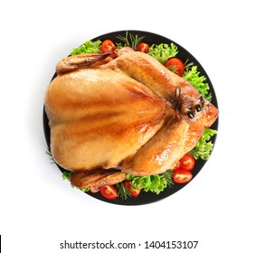 Platter Of Cooked Turkey With Garnish On White Background, Top View