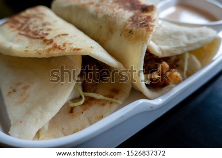 A platter of delicious middle eastern shwarmas.