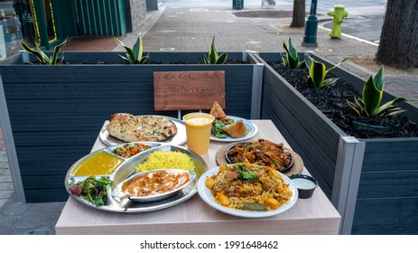 Platter of Delicious Pakistani Food Served Outside