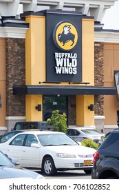 PLATTSBURGH, USA - AUGUST 23, 2017 : Buffalo Wild Wings Restaurant And Logo. Buffalo Wild Wings Is An American Casual Dining Restaurant And Sports Bar Franchise