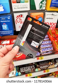 PLATTSBURGH, USA - SEPTEMBER 10, 2018: A Man Holding Mastercard Giftcard. Mastercard Is An American Financial Multinational Corporation.