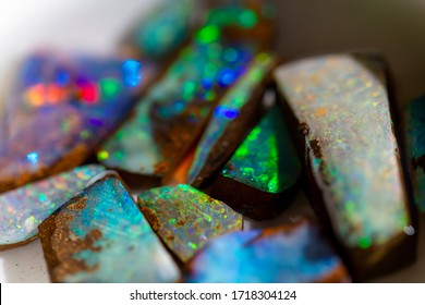 The play of color in Australian precious boulder opal. - Shutterstock ID 1718304124