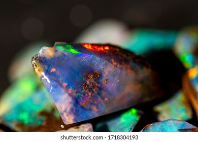 The play of color in Australian precious boulder opal. - Shutterstock ID 1718304193