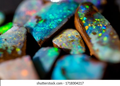 The play of color in Australian precious boulder opal. - Shutterstock ID 1718304217