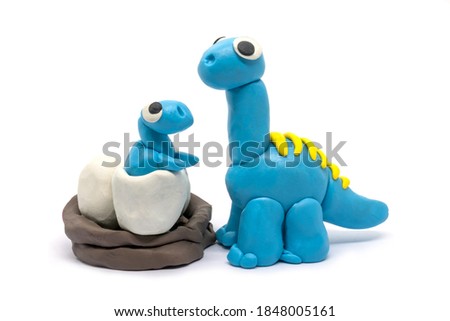 Play dough Brachiosaurus and baby on white background. Handmade clay plasticine
