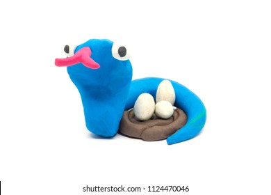 Play Dough Snake On White Background. Handmade Clay Plasticine
