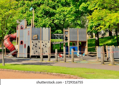 Play park in Edinburgh Princes street gardens closed off to children due to the coronavirus lockdown. Empty swings and slides. Edinburgh City, Scotland UK. mAY 2020