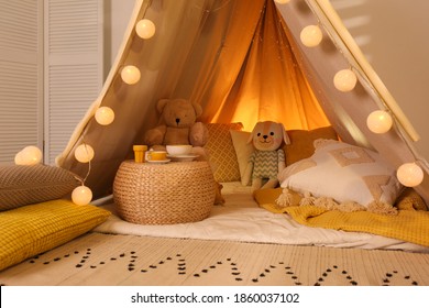 Play Tent With Toys And Pillows Indoors, Closeup. Modern Children's Room Interior