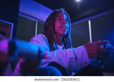 Play video game spend time together have fun at home on weekend. Happy husband and wife laugh relax with online game, Lifestyle activity concept. - Powered by Shutterstock - Get 15% off with code: PIKWIZARD15