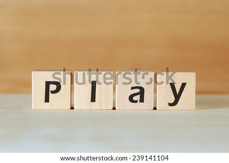 play word on wood blocks