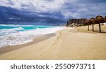 Playa Delfines beach in Cancun with powdery silver sands and Turquoise blue waters of the caribbean sea,during the October hurricane season in the Hotel Zone of Cancun,Quintana Roo,Mexico