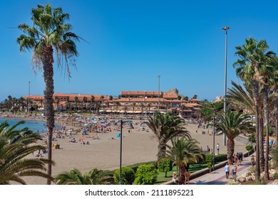 Playa Las Vistas, Los Cristianos, Tenerife, Canary Islands, Spain - November 1, 2021: Lots Of Tourists Crowding The Busy Beach And Resort In One Of The Most Favorite Spots In The South Of The Island