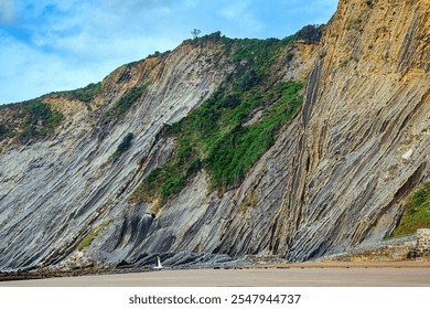 Playa Zumaya. The Basque Country. Incredibly bizarre coastal cliffs. Coast of the Bay of Biscay, Atlantic. Itsurun Beach is surrounded by impressive geological formations and cliffs - Powered by Shutterstock