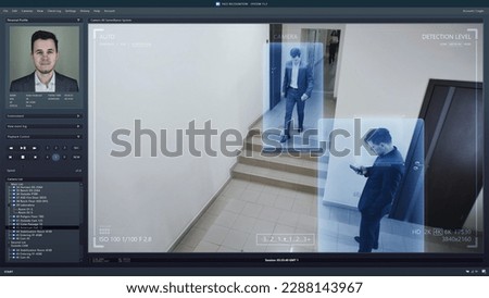 Playback office CCTV camera on computer. Workers walk in business office corridor. AI software with facial recognition and personal profiles. Security camera with digital face scanning analyze system.