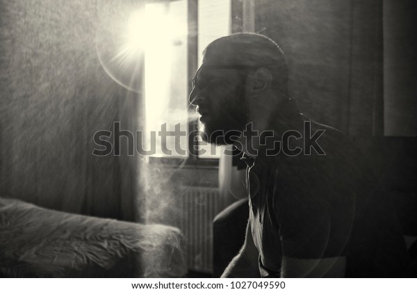Playboy Sitting Inside His Mansion Smoking People