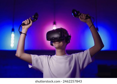 The player plays the game using virtual reality. Neon style. High quality photo - Powered by Shutterstock