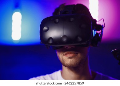 The player plays the game using virtual reality. Neon style. High quality photo - Powered by Shutterstock