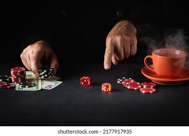 The Player Points His Finger At The Maximum In The Winning Combination When Playing Craps In A Poker Club. Luck Or Luck In The Casino.