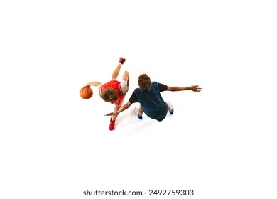 Player in red dribbling, while opponent in blue attempts to block him from ground against white studio background. Aerial view. Concept of professional sport, competition, match, team games. Ad - Powered by Shutterstock