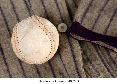 A Player's Old Uniform And Baseball Gear.