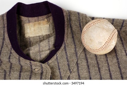 A Player's Old Uniform And Baseball Gear.