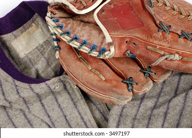 A Player's Old Uniform And Baseball Gear.