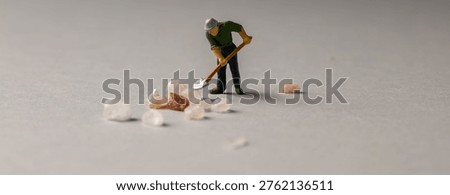 a playful and creative conceptual image featuring tiny miniature people figures working on uncooked pasta