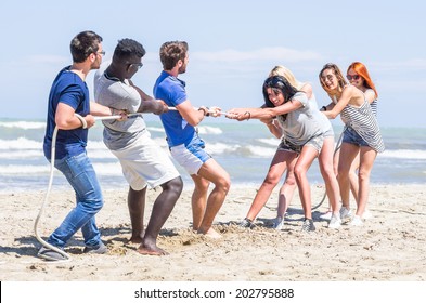 playful friends on the beach - Powered by Shutterstock
