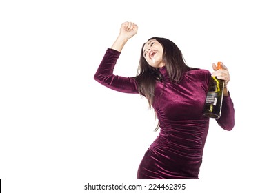 playful, happy young woman with a bottle in her hand