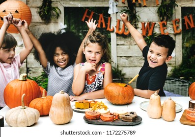 Playful Kids Enjoying The Halloween Festival