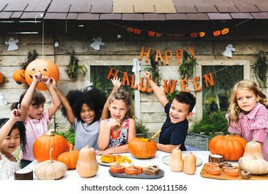 Playful Kids Enjoying The Halloween Festival