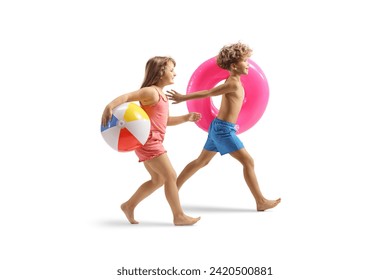 Playful kids in swimwear running and carrying a swimming ring and a ball isolated on white background - Powered by Shutterstock