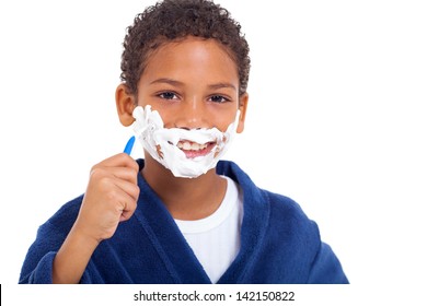 Playful Little African Young Boy Shaving Face Over White Background