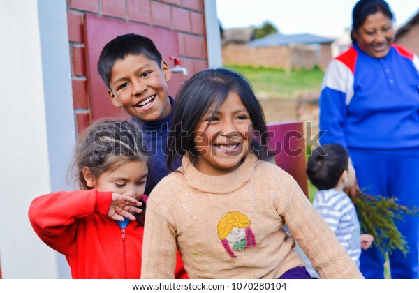 Playful native american children in the countryside.