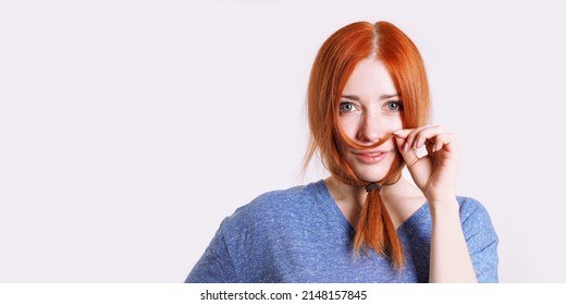 playful young woman in disguise with hair tied to long beard