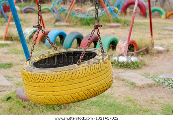 Playground built with old tires for children\
Recycling old tires