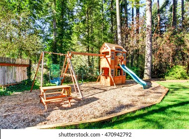 Playground For Kids On Backyard. Backyard With Lawn And Trees. Northwest, USA