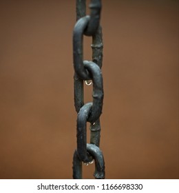 Playground Swingset Chain In The Rain