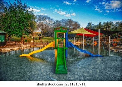 Playground in water in an amusement park - Shutterstock ID 2311315911
