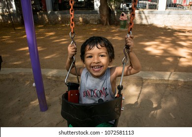 Playgroup Boy Playing In The Garden