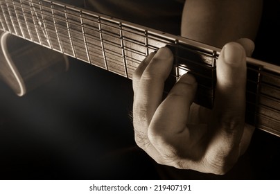 Playing Acoustic Guitar,guitarist Or Musician In Sepia Filtered Color. 